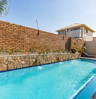 Shared swimming pool at Miombo Mews