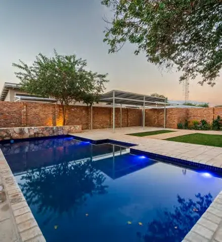 Shared pool at The Pods at dusk
