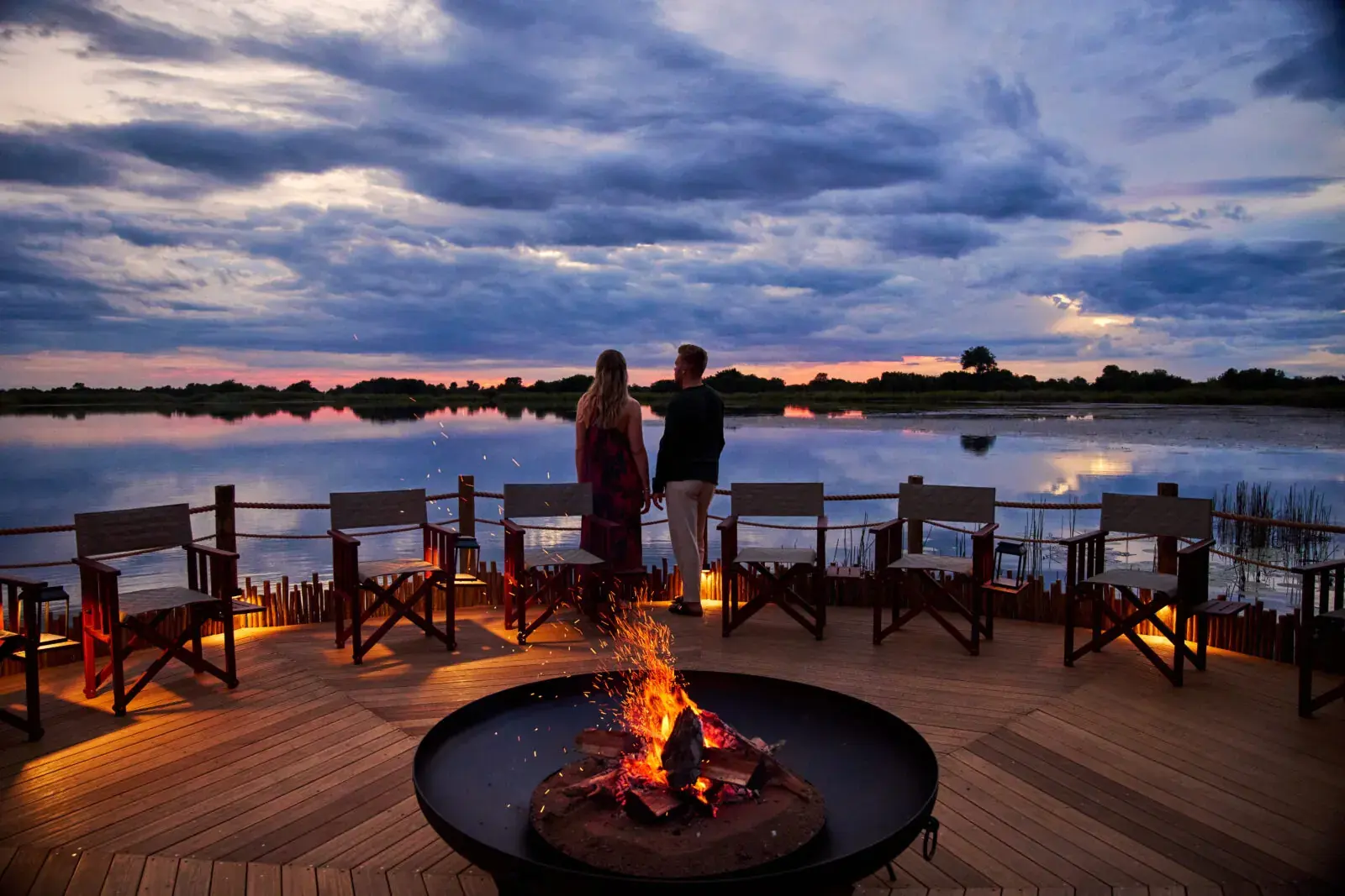 Overwater fire deck at Xugana Island Lodge